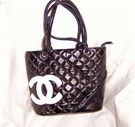 black chanel purse with white logo|black chanel purse price.